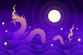 Naga or thai dragon in the river with fire ball and full moon