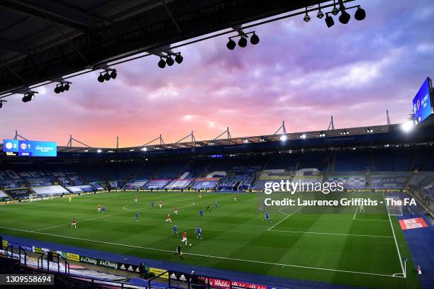 General view of play as the sun sets during The Emirates FA Cup Quarter Final match between Leicester City and Manchester United at The King Power...