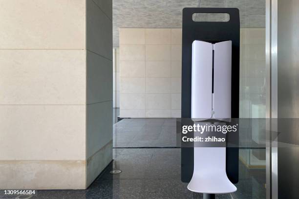 automatic hand sanitizer dispenser - soap dispenser stock pictures, royalty-free photos & images