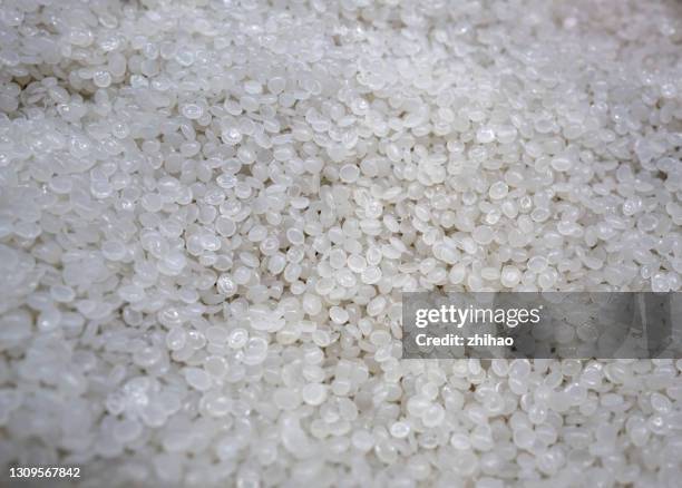 white plastic pellets - polypropylene imagens e fotografias de stock