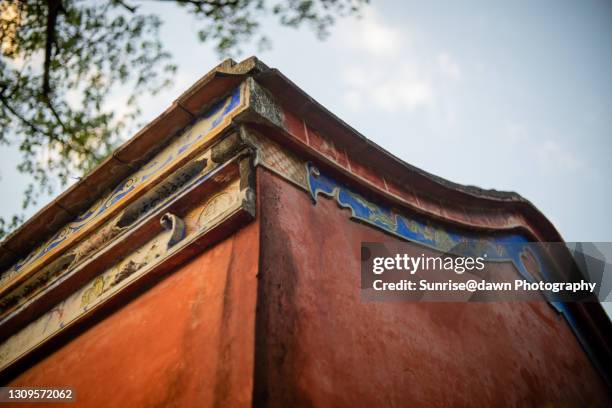 roofs and red walls of confucius temple - tainan stock pictures, royalty-free photos & images