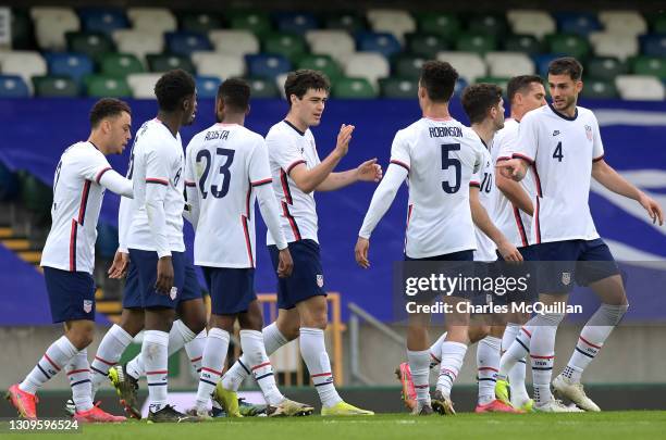 Giovanni Reyna of USA celebrates with Antonee Robinson and teammates after scoring their team's first goal during the International Friendly between...