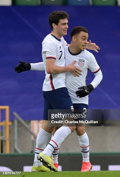 Giovanni Reyna of USA celebrates with teammate Sergino Dest after scoring their team's first goal during the International Friendly between Northern...