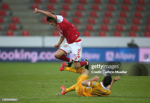 Christian Norgaard of Denmark battles for possession with Igor Armas of Moldova during the FIFA World Cup 2022 Qatar qualifying match between Denmark...