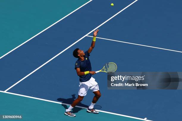 Felix Auger-Aliassime of Canada returns a shot during his men's singles third round match against John Isner of the United States on Day 7 of the...