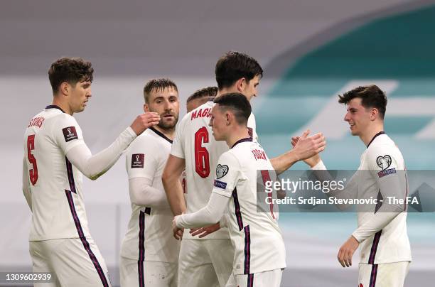 Mason Mount of England celebrates with teammates after scoring their team's second goal during the FIFA World Cup 2022 Qatar qualifying match between...