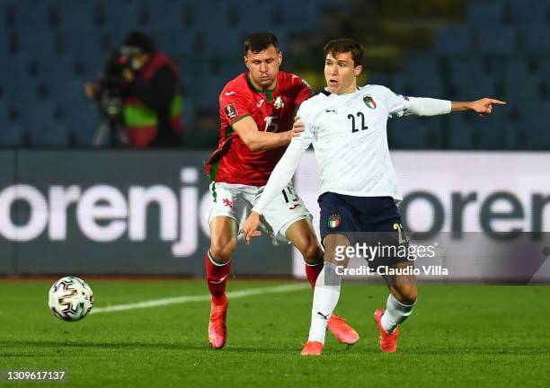 Federico Chiesa of Itlay competes for the ball with Vasil Bozhikov of Bulgaria during the FIFA World Cup 2022 Qatar qualifying match between Bulgaria...