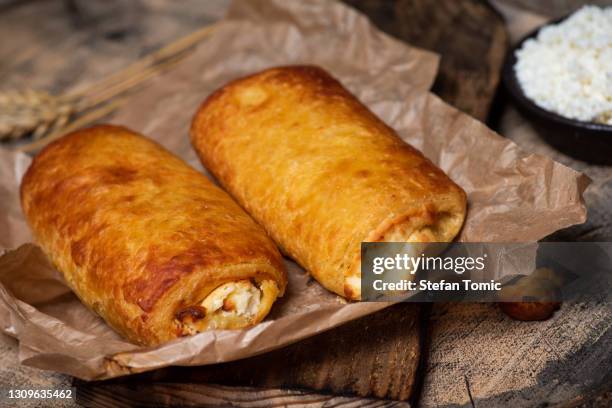 homemade puff pastry crushed cheese pie - cheese puff pastry roll stock pictures, royalty-free photos & images