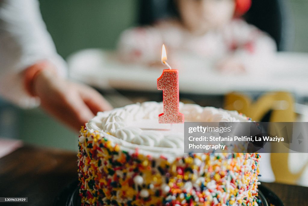 Baby First Birthday Cake with Lit Candle