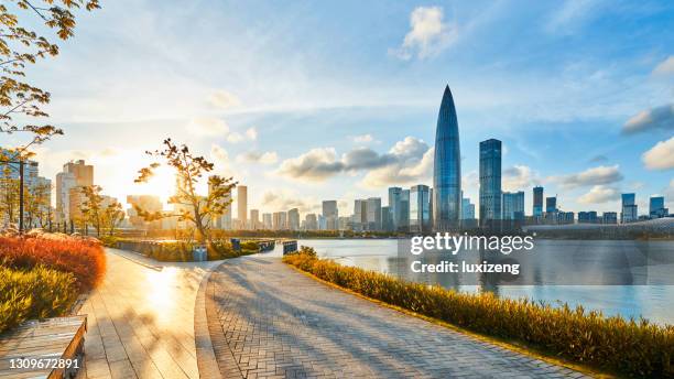 sunset in shenzhen - shenzhen street stock pictures, royalty-free photos & images