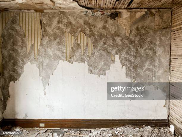 torn living room wallpaper in derelict home - ugly wallpaper stock pictures, royalty-free photos & images