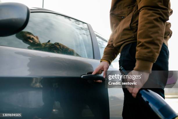 man drinking while driving - alcohol forbidden stock pictures, royalty-free photos & images