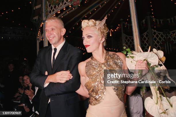Fashion designer Jean Paul Gaultier and singer Madonna walk the runway during the Jean Paul Gaultier Ready to Wear Spring/Summer 1995 show as part of...