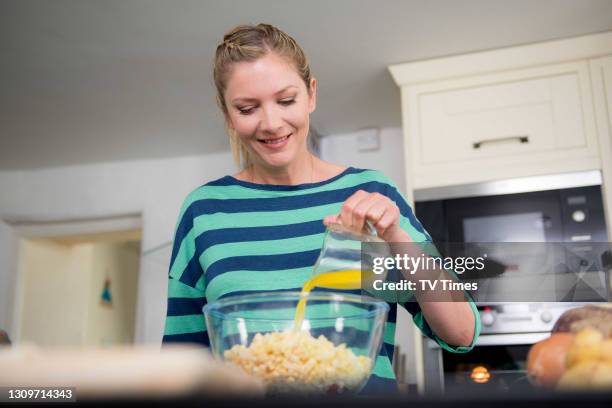 Actress and celebrity chef Lisa Faulkner filming in a kitchen, on June 11, 2014.