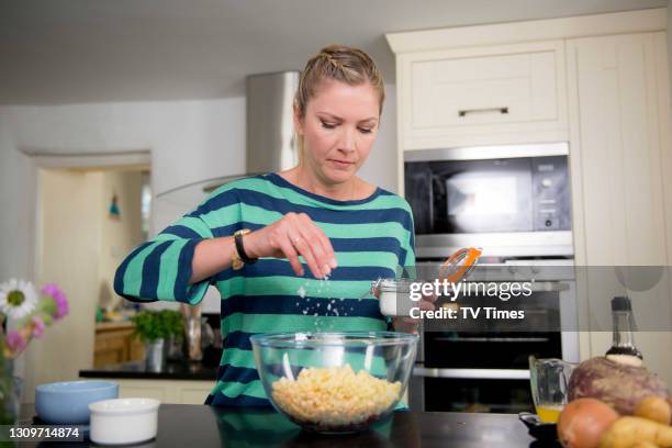 Actress and celebrity chef Lisa Faulkner filming in a kitchen, on June 11, 2014.