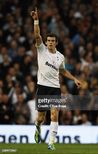 Gareth Bale of Tottenham Hotspur celebrates as he scores their first goal during the Barclays Premier League match between Tottenham Hotspur and...