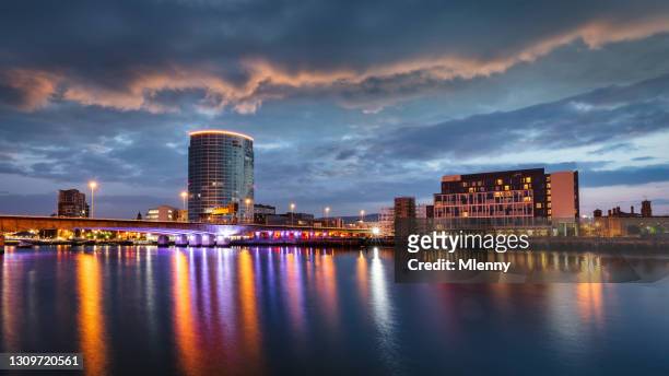 belfast city sunset panorama lagan river northern ireland - belfast ireland stock pictures, royalty-free photos & images