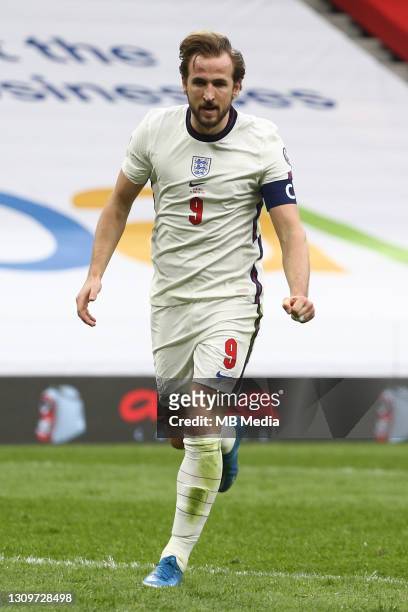 Harry Kane celebrates after opening the scoring for England during the FIFA World Cup 2022 Qatar qualifying match between Albania and England at the...