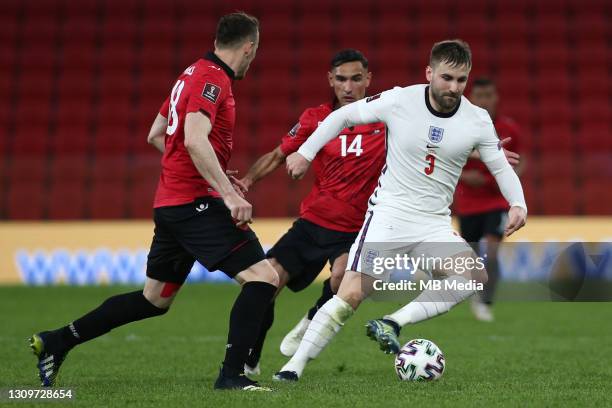 Luke Shaw of England is closed down by Qazim Laci of Albania during the FIFA World Cup 2022 Qatar qualifying match between Albania and England at the...