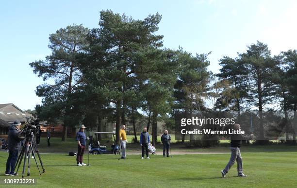 Sky Sorts Golf presenter, Wayne Riley watches an amateur golfer tees off at Pine Ridge Golf Club on March 29, 2021 in Camberley United Kingdom. Today...