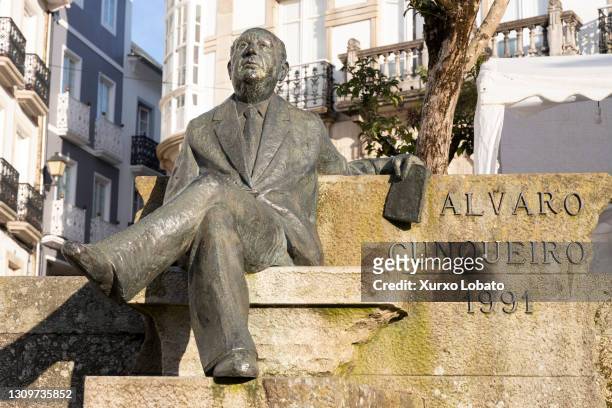 Mondonedo SPAIN Monument dedicated to the writer Alvaro Cunqueiro, 1911-1981, in the historic center looking at the cathedral. He was a Spanish...