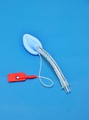 Laryngeal Airway Mask (LMA) on a blue background