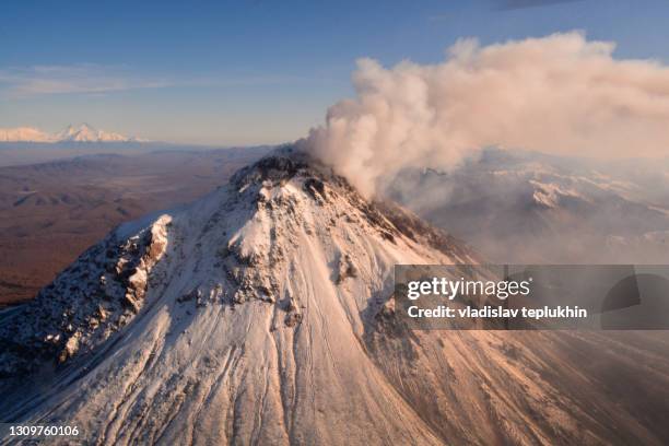 volcano kizimen. russia, kamchatka territory - kamchatka volcano stock pictures, royalty-free photos & images