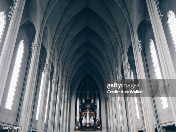 the ceiling of hallgrímskirkja cathedral - cathedral ceiling stock pictures, royalty-free photos & images