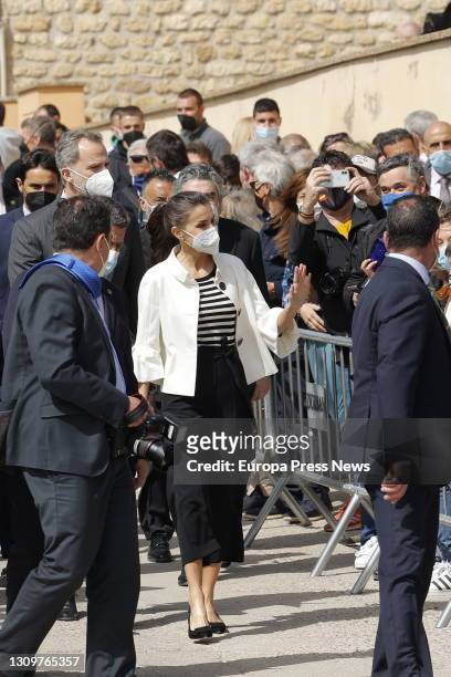 Queen Letizia of Spain and King Felipe VI of Spain wave after their visit to Goya's birthplace where they toured the exhibition "Solana Versus Goya....