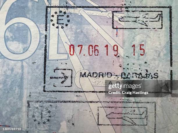 close up opened passport with entry stamps formadrid - passport page stock pictures, royalty-free photos & images