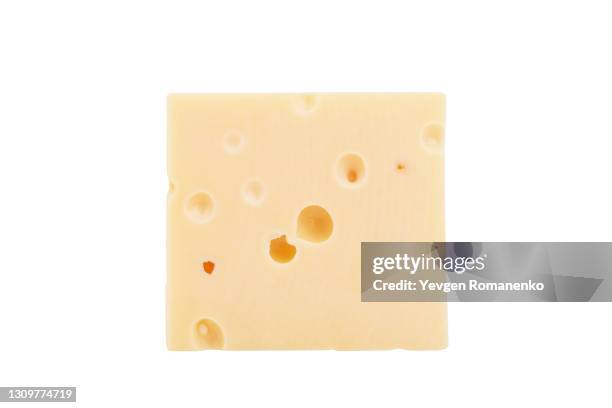 cheese cube isolated on white background - edamer stock-fotos und bilder