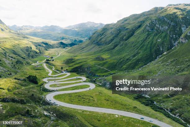 winding road in switzerland. - julierpass stock-fotos und bilder