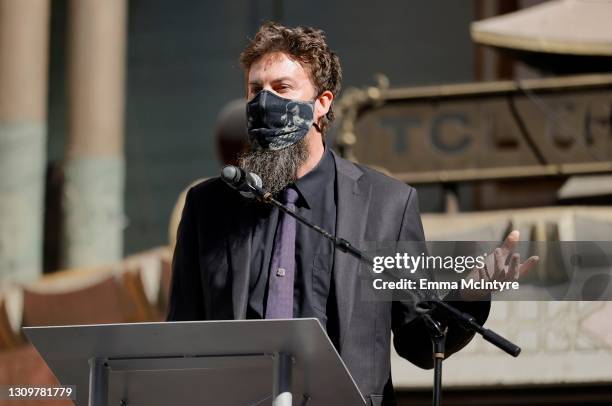Adam Wingard speaks onstage during the post-pandemic reopening and ribbon cutting ceremony hosted by TCL Chinese Theatre on March 29, 2021 in...