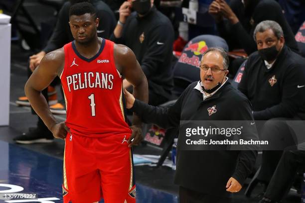 Head coach Stan Van Gundy of the New Orleans Pelicans and Zion Williamson talk during a game at the Smoothie King Center on March 27, 2021 in New...