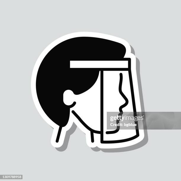 person with medical protective face shield. icon sticker on gray background - protective face shield stock illustrations