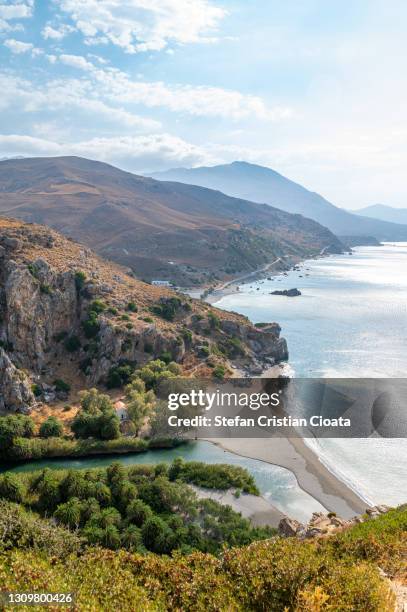 preveli beach (palm beach) at libyan sea, crete , greece - crete rethymnon stock pictures, royalty-free photos & images