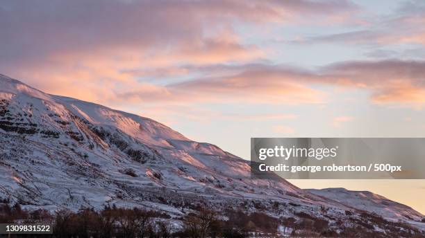 scenic view of snowcapped mountains against sky during sunset,glasgow,united kingdom,uk - campsie fells stock pictures, royalty-free photos & images