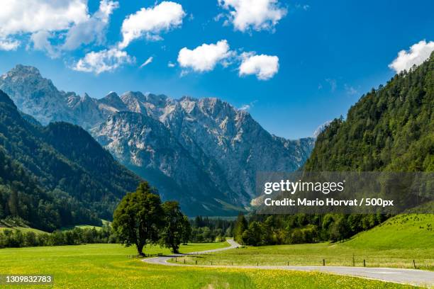 scenic view of landscape and mountains against sky,logarska dolina,slovenia - eslovenia fotografías e imágenes de stock