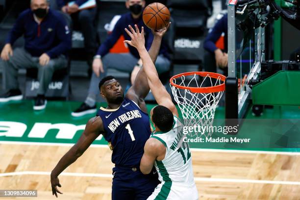 Zion Williamson of the New Orleans Pelicans takes a shot against Grant Williams of the Boston Celtics during the first quarter at TD Garden on March...