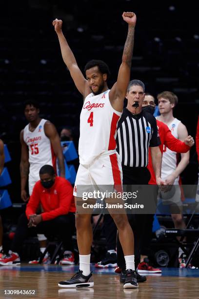 Justin Gorham of the Houston Cougars celebrates after defeating the Oregon State Beavers in the Elite Eight round of the 2021 NCAA Men's Basketball...