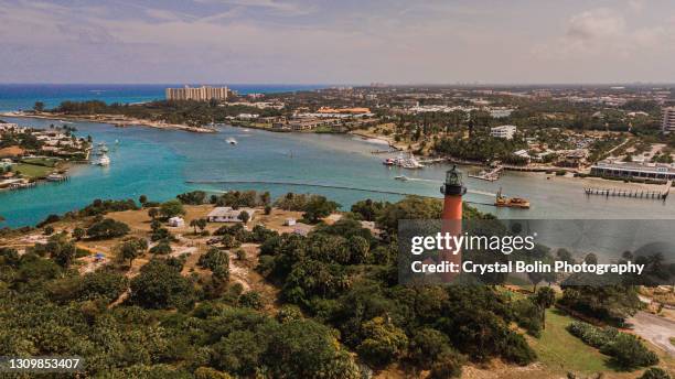 aerial view of jupiter lighthouse in jupiter, florida at mid-day during spring break in march of 2021 - jupiter florida stock pictures, royalty-free photos & images