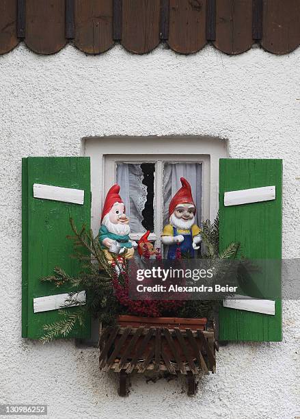 House window covered with typial German garden gnomes is pictured on October 31, 2011 in Wessling, Germany.