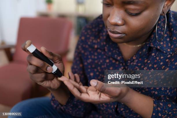 one test can tell a lot - blood finger stick stock pictures, royalty-free photos & images