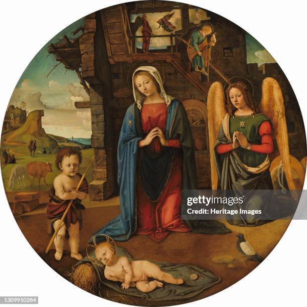 The Nativity with the Infant Saint John, circa 1495/1505. Artist Piero di Cosimo. .