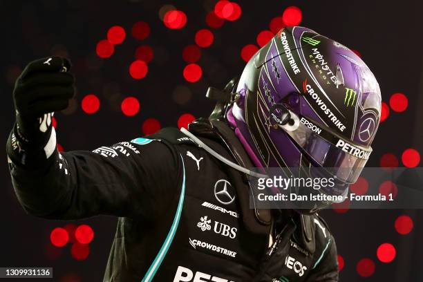 Lewis Hamilton of Great Britain and Mercedes AMG Petronas F1 celebrates in parc ferme after winning the F1 Grand Prix of Bahrain at Bahrain...