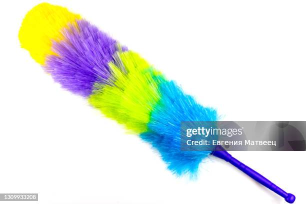 striped brush sweep dust cleaning isolated on white background close up top view - duster stock-fotos und bilder