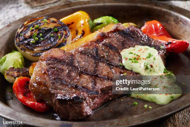 bbq venison (elk) new york strip steak with roasted vegetables - bison meat stock pictures, royalty-free photos & images