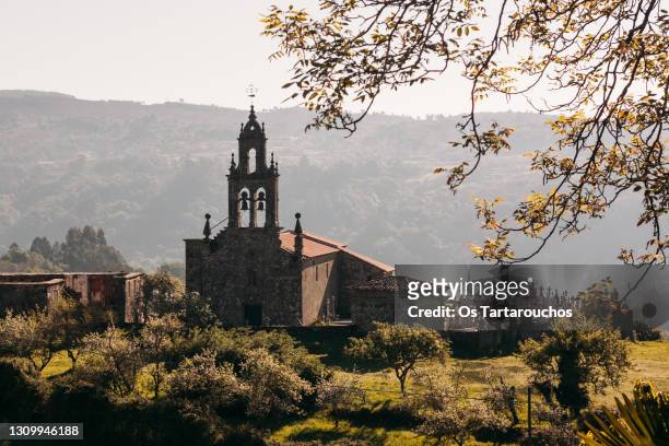 church and cemmitery in galicia - church sunset rural scene stock pictures, royalty-free photos & images