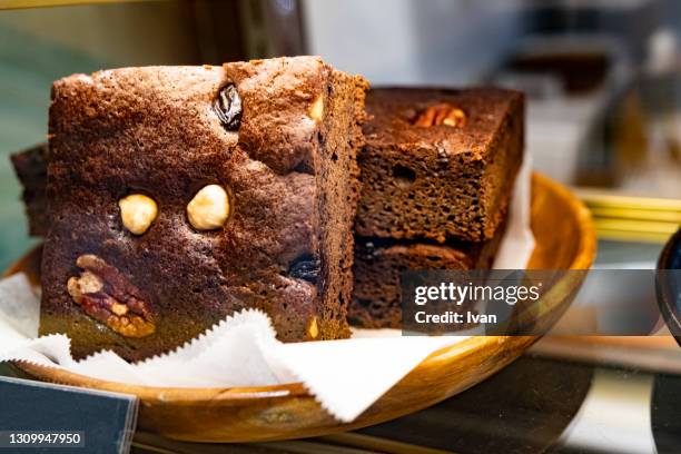 stack of homemade gluten free brownies with chocolate and coffee glazing - brownie stockfoto's en -beelden