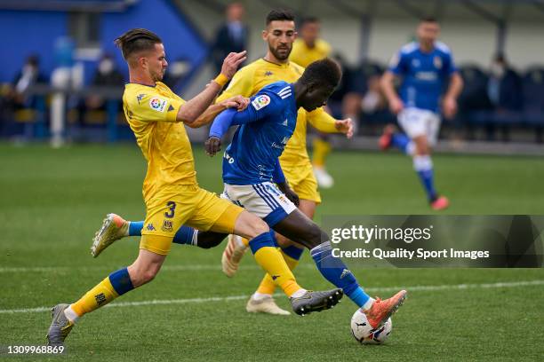 Jose Carlos Ramirez of AD Alcorcon battle for the ball with Samuel Obeng of Real Oviedo during the Liga Smartbank match betwen AD Alcorcon and Real...